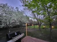 Spacious 4-bedroom house on 1 acre, fenced, GAME ROOM, and party tent rental! Hotels near Lupulin Brewing