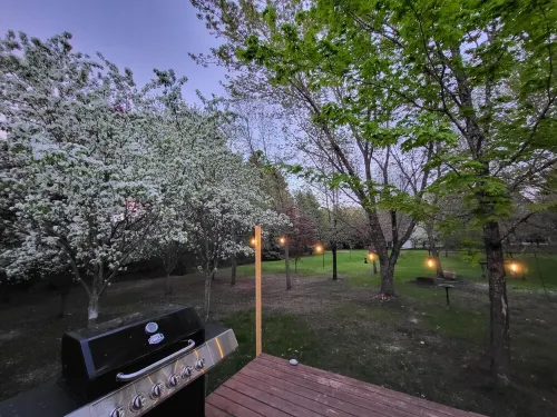 Spacious 4-bedroom house on 1 acre, fenced, GAME ROOM, and party tent rental!