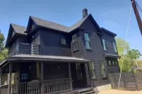 Unique two story house nestled 1 mile away from downtown.