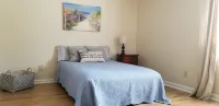 Walk to the Beach and great restaurants! Family-sized condo with balcony.