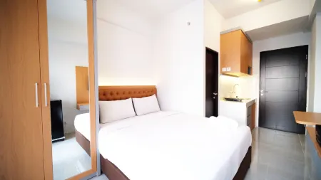 Tidy and Cozy Stay Studio Apartment at Suncity Residence Отели в г. Sidoarjo