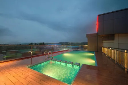 Kowju Airport Hotel Calicut Отели в г. Манжери