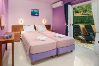 Poseidon Suites by CorfuEscapes