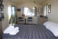 Pohara Beach Top 10 Holiday Park فنادق في Pohara