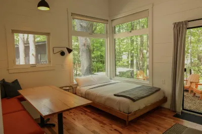 Serene Outdoor Seating and Modern Amenities - Luxurious Enchanting Cabin