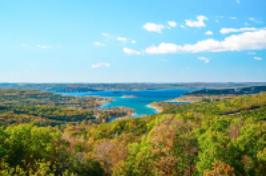 All-season retreat on golf course with indoor/outdoor pools, hot tub, central AC