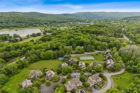 Ample Seating and Access to Quechee Club Amenities - Cozy Retreat