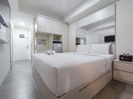 Warm and Cozy Style Studio Room at Paltrow City Apartment