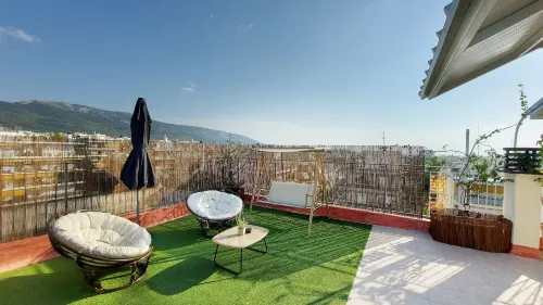 A Bright and Relaxing Penthouse Hotels in Papagou-Holargos