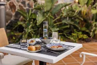 Corallium Beach by Lopesan Hotels - Adults Only - breakfast