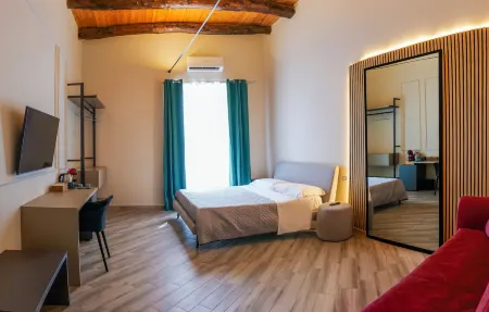 Rooftop Parthenopeo Contemporary Rooms Отели рядом с достопримечательностью «Церковь Сант Анджело а Нило»