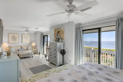 Oceanfront, vintage beach house steps from the sand on Seabrook Island.