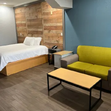 The Symphony Inn & Suites Hotels near Sri Guruvayurappan Temple Houston