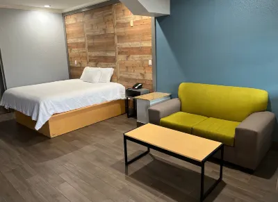 The Symphony Inn & Suites Hoteles en Missouri City