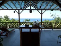 La Maison Coloniale in a postcard setting overlooking the Caribbean Sea