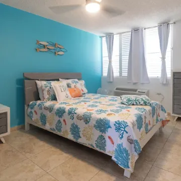 Coqui Beach Home, Paseo del Faro Combate