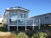 Orchid - dog friendly with sea view on Rockley Park, Poole