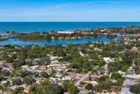 Cozy two-bedroom cottage by Nokomis Beach. Sleep 8.