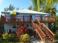 Large 4 Bed/4Bath Beachfront Apartment Sleeps 8 and Directly  on Hoopers Bay Hotel a 