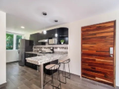 Centrally located pet friendly condo with pool - walk to everything!