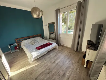 Upper villa with swimming pool and private grounds.