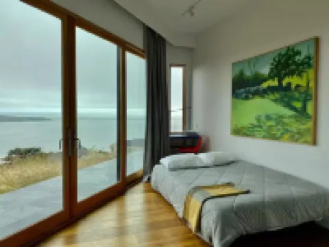 Sky House • Boutique seaside retreat with cinema room and spa