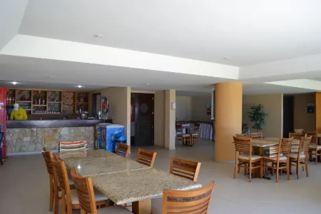 Ground floor flat with balcony Marupiara suites 118, Condo Beira Mar 12X interest-free Отели рядом с достопримечательностью «Port of Suape»