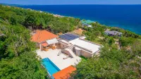 West Bay Latitude large 4 bedroom home just 5 minutes to West Bay Beach Hôtels à : 