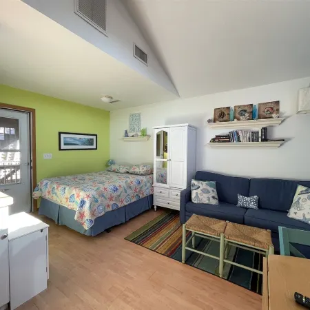 15 Don't Worry Be Happy Studio Bedroom Condo by RedAwning