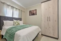 Classy 2bedroom Apartment at 93 New Hotels near Makhulong Stadium