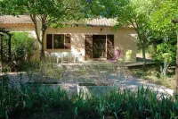 In a forest, in a haven of greenery with private swimming pool.