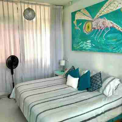 2nd FL high ceiling loft with pool Rooms