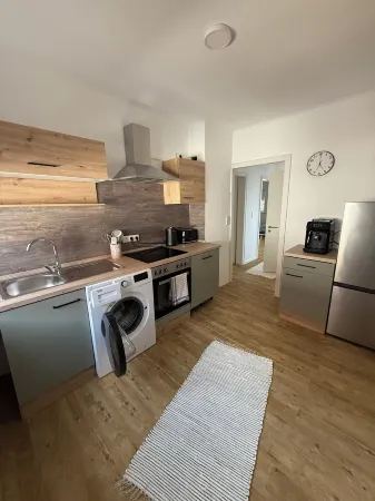 Cozy 2-room apartment with large roof terrace