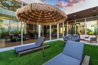 Signature Waterfront Villa by the Glamhomes