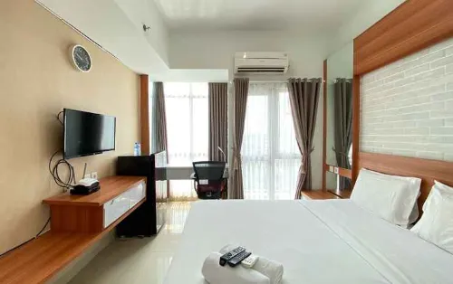 Monochrome Studio Room at Taman Melati Jatinangor Apartment by Travelio - Pools