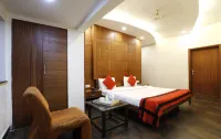 Hotel Trimoorti Hotels near Malik Ghat Flower Market