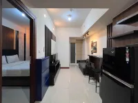Warm and Cozy 2BR Vida View Makassar Apartment By Travelio