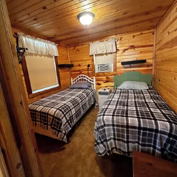 Cute Cabin on Big Pine Lake with a Large Fenced Yard and Lake Access