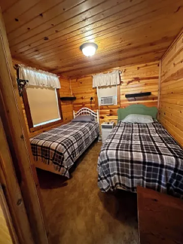 Cute Cabin on Big Pine Lake with a Large Fenced Yard and Lake Access