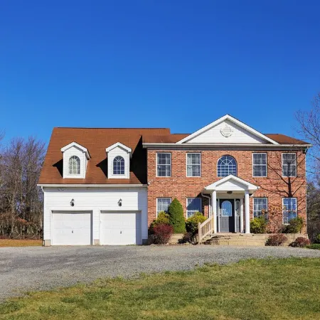 Spacious 6-bedroom Pocono Home with Hot Tub, Game and Theater rooms, Fire Pit!