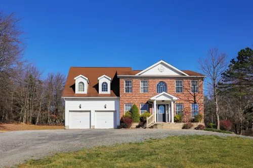 Spacious 6-bedroom Pocono Home with Hot Tub, Game and Theater rooms, Fire Pit!