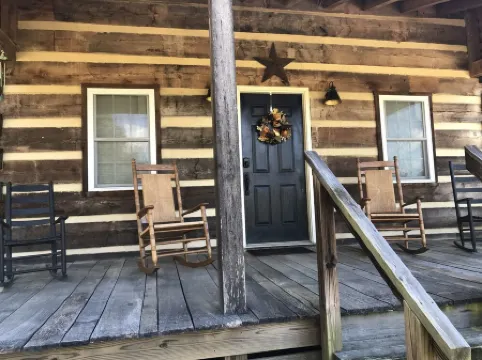 The Natchez - quiet front porch & rockers.