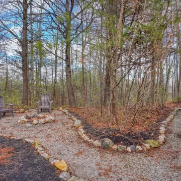 Quaint cabin nestled in the pines.