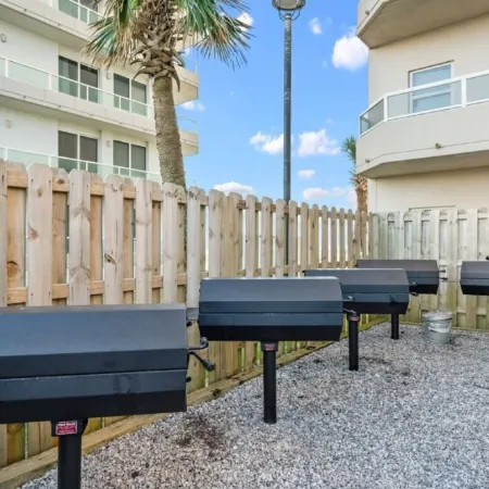 Luxurious 2nd floor beachfront condo w wrap-around balcony @ The Enclave