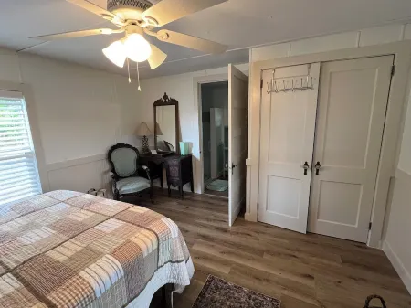 Completely renovated mobile home sitting own a pond.