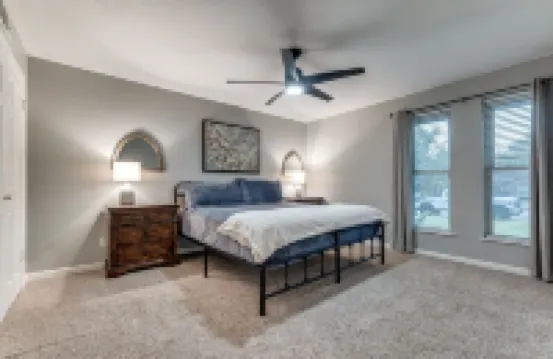 Heated Pool, Putting Green, Movie Theater and more! 4 bed/3 bath