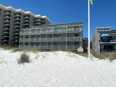 Fabulous 1BR Condo with amazing beach views sleeps 4.  Park by door.  Pool.