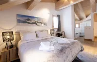 Duplex 200m², full services  , 5 bedrooms, 4 bathrooms / d, south balcony and 3 parking spaces Hotels in Montvalezan