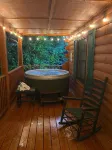 3/2 Log Cabin with year round rushing creek. Hot tub, wifi, A/C, arcade game. - 3-Star