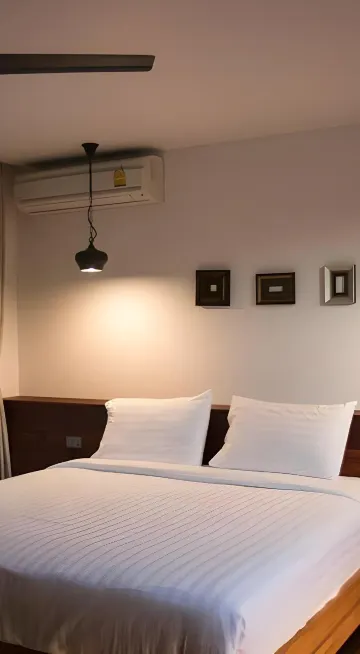 ห้องเตียงคิงไซส์พร้อมลานระเบียงและวิวสวน